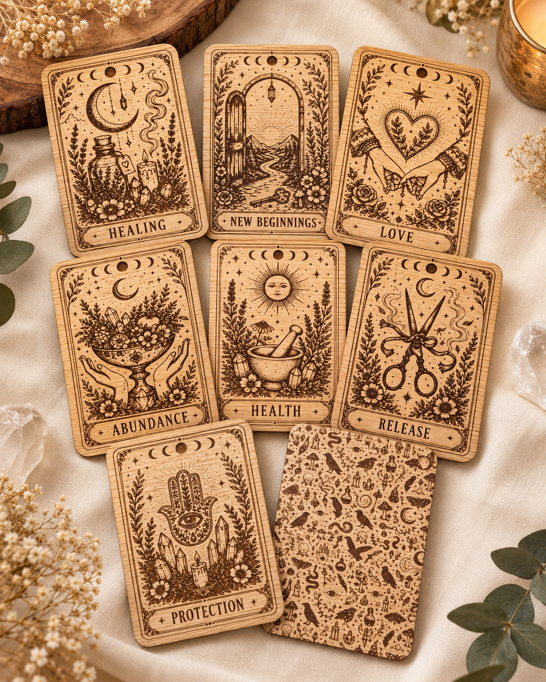 Set of seven engraved wooden intention cards with patterned back