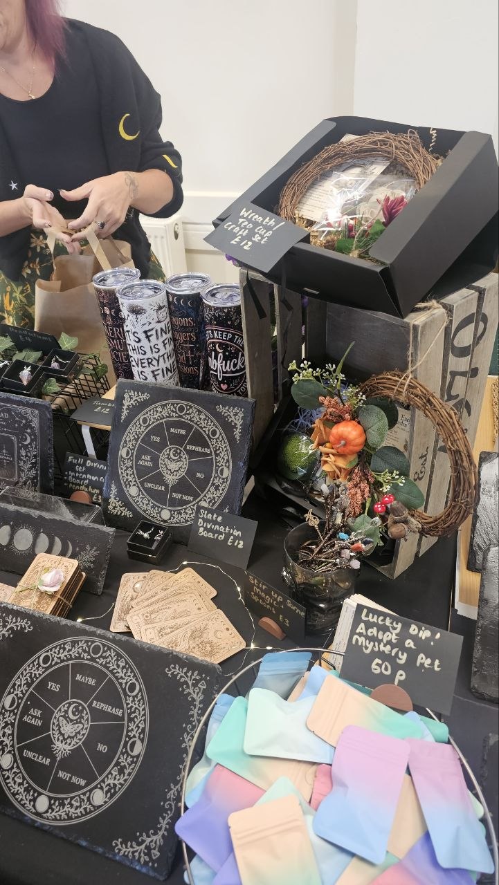 Pendulum boards, intention cards and handmade wreaths on the Bear Phoenix Creations stall